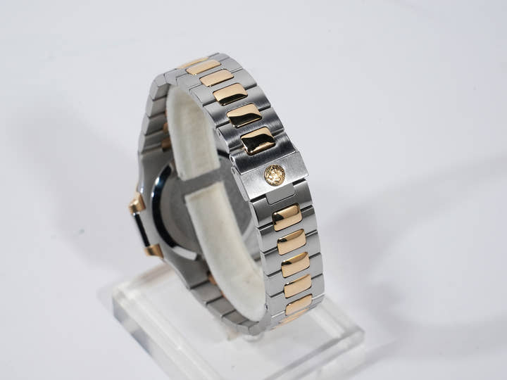 Patek Philippe Nautilus Ref. 3800/1JA Stainless Steel/Yellow Gold Champagne Dial Used c57cxbmq
