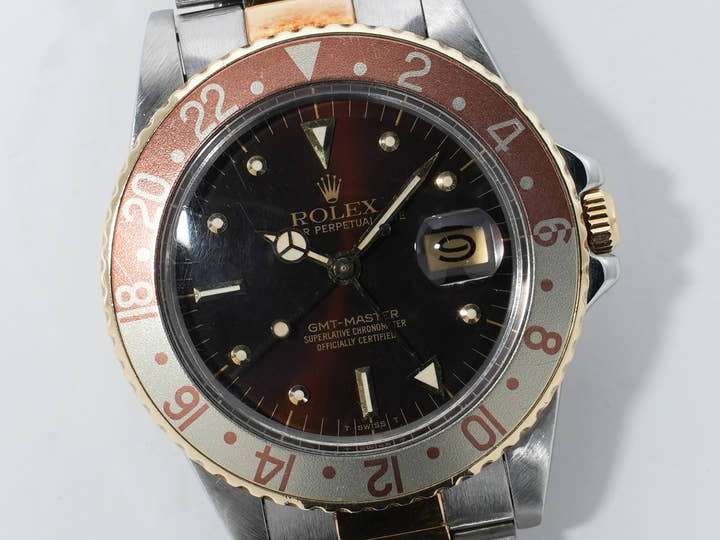 Rolex GMT-Master Ref. 16753 Stainless Steel/Yellow Gold Brown Dial Oyster Bracelet Used e4pi6upm