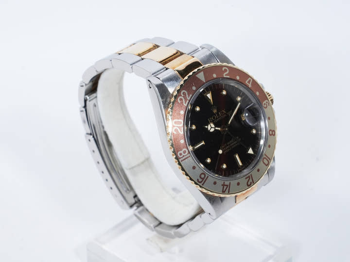Rolex GMT-Master Ref. 16753 Stainless Steel/Yellow Gold Brown Dial Oyster Bracelet Used e4pi6upm