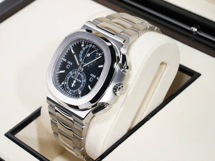 Patek Philippe Nautilus Travel Time Chronograph Ref.5990/1A-011 Stainless Steel Blue Sunburst Dial Unused gv2f58qq
