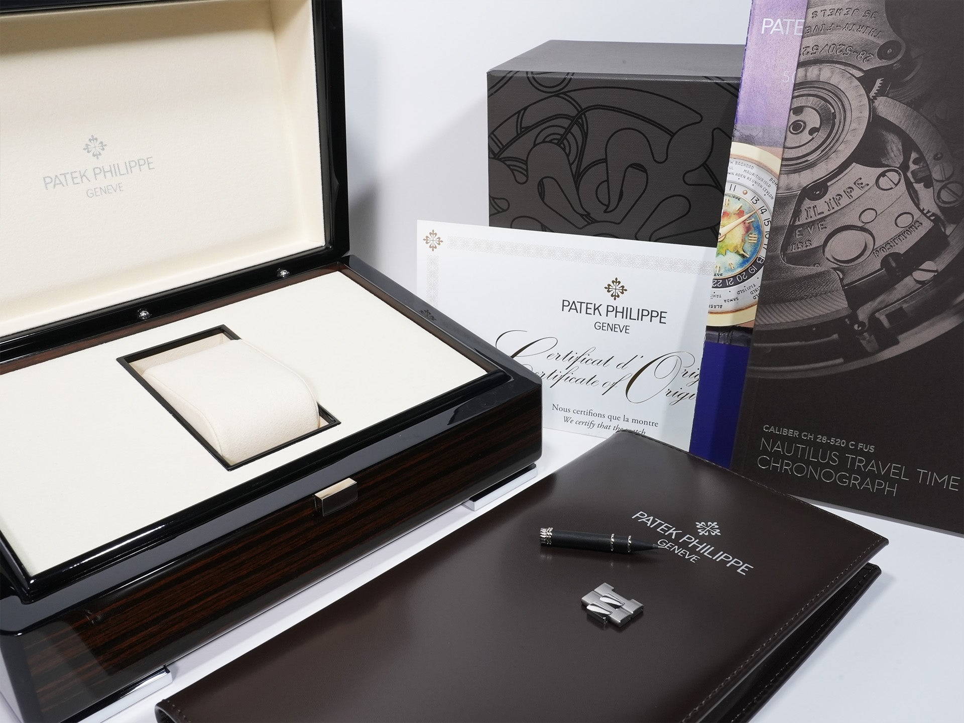 Patek Philippe Nautilus Travel Time Chronograph Ref.5990/1A-011 Stainless Steel Blue Sunburst Dial Unused gv2f58qq
