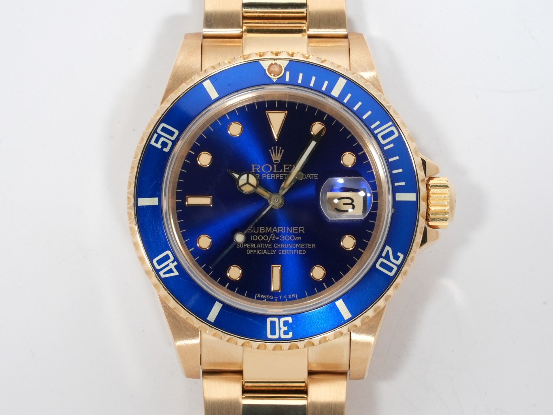 Rolex Submariner Date Ref. 16808 Yellow Gold Blue Dial Pre-owned swcopyzn
