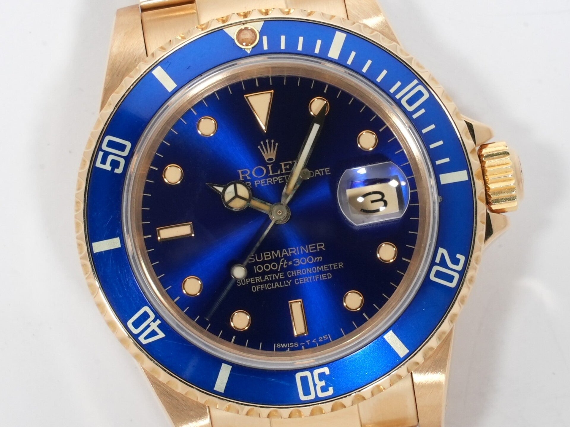 Rolex Submariner Date Ref. 16808 Yellow Gold Blue Dial Pre-owned swcopyzn