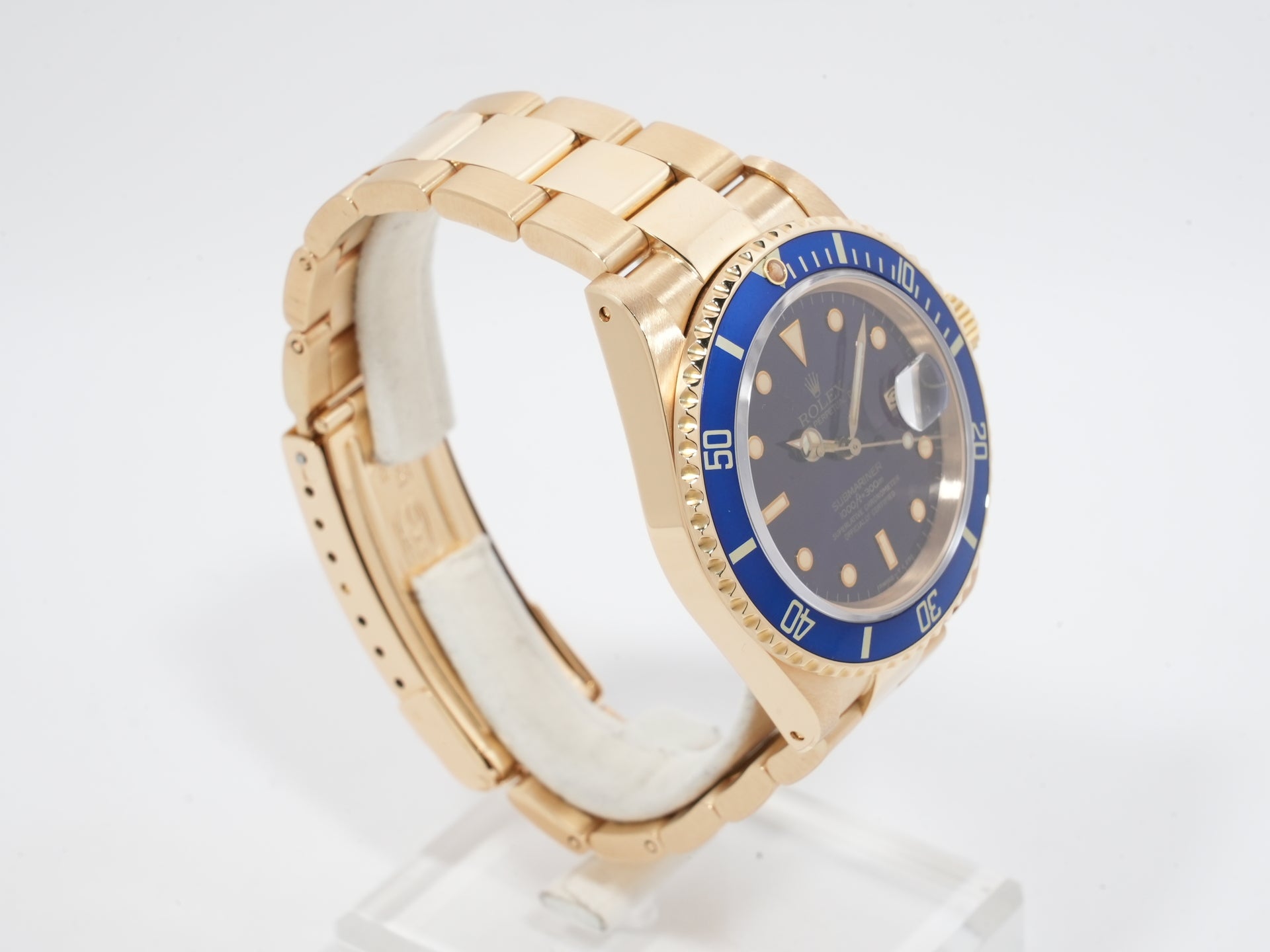 Rolex Submariner Date Ref. 16808 Yellow Gold Blue Dial Pre-owned swcopyzn