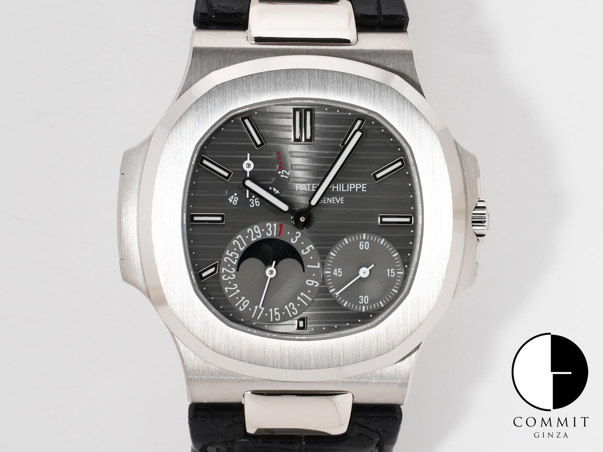 Patek Philippe Nautilus Petit Complication Ref. 5712G-001 White Gold Slate Dial Used v9vb62sf