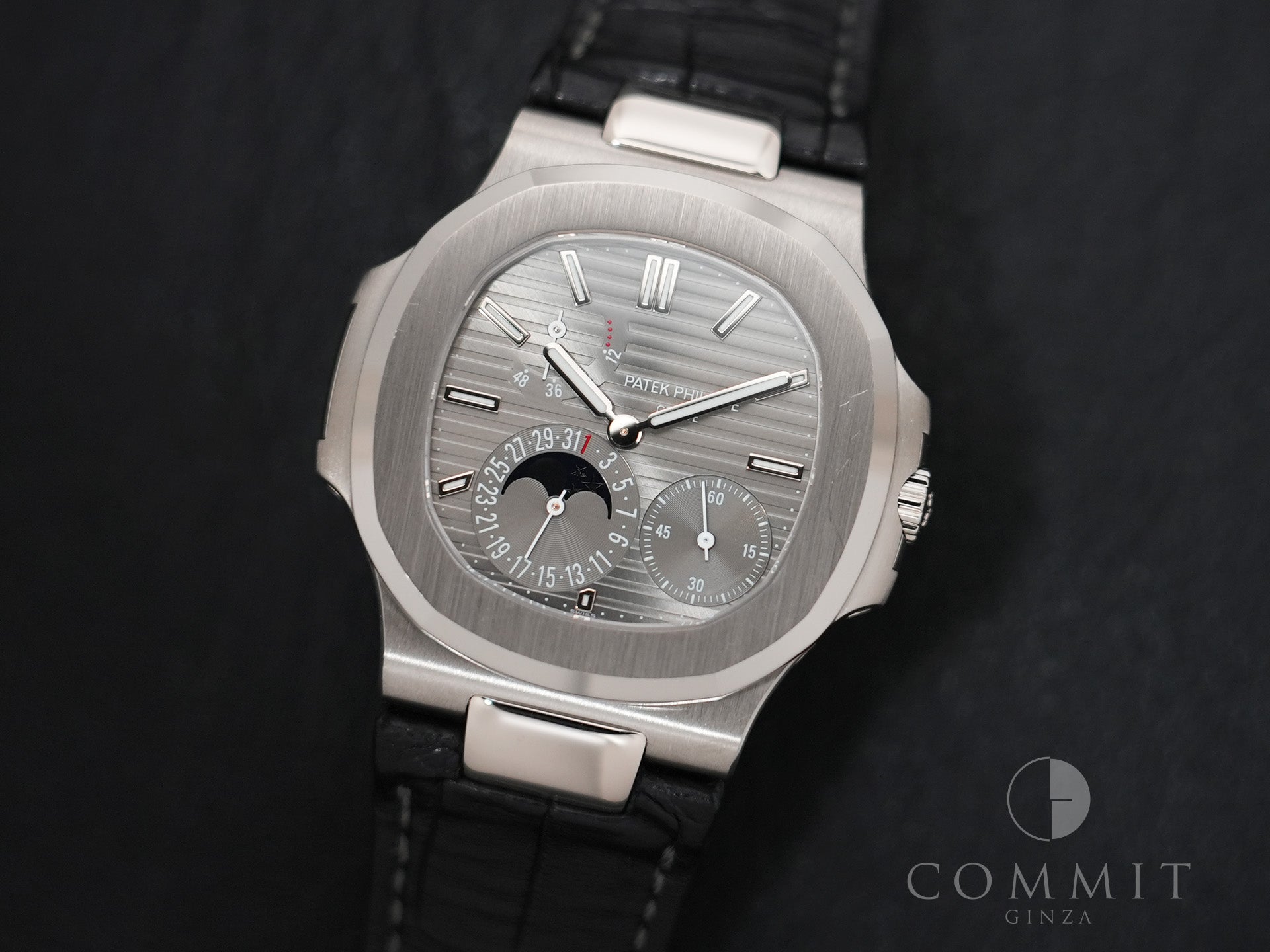 Patek Philippe Nautilus Petit Complication Ref. 5712G-001 White Gold Slate Dial Used v9vb62sf