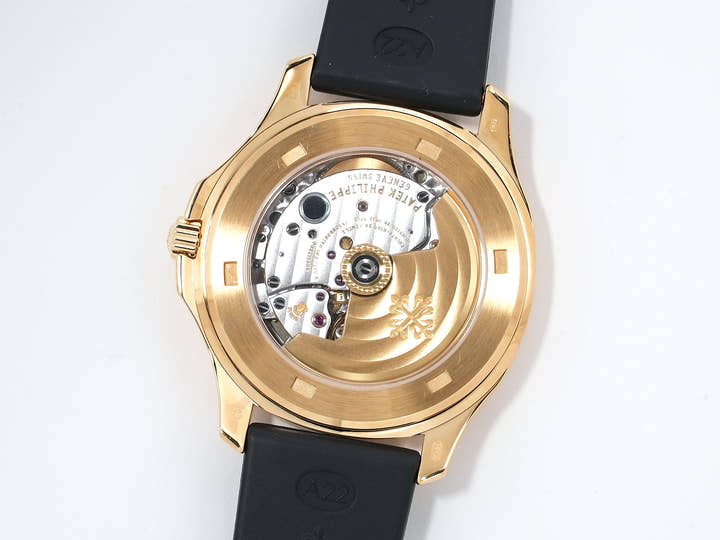 Patek Philippe Aquanaut Ref. 5065J-001 Yellow Gold Black Dial Used 5h3ebcnd