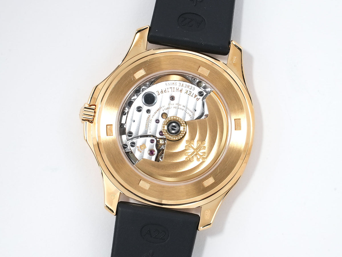Patek Philippe Aquanaut Ref. 5065J-001 Yellow Gold Black Dial Used 5h3ebcnd