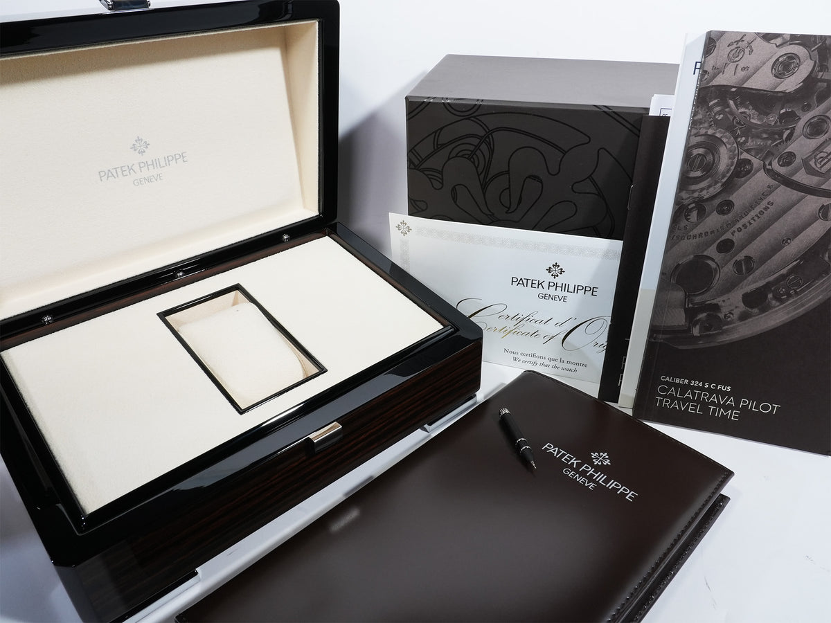Patek Philippe Calatrava Pilot Travel Time Ref. 7234G-001 White Gold Blue Dial Pre-owned bb8sqeyu