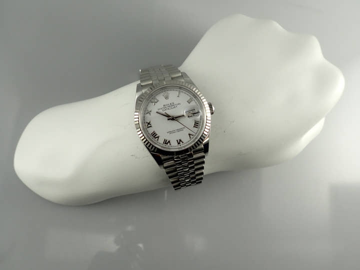 Pre-owned Rolex Datejust 36 Ref. 126234, stainless steel/white gold, white Roman numeral dial, Jubilee bracelet.  (40YPLCFC likely refers to an internal reference number or code)