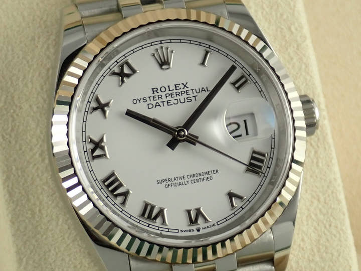 Pre-owned Rolex Datejust 36 Ref. 126234, stainless steel/white gold, white Roman numeral dial, Jubilee bracelet.  (40YPLCFC likely refers to an internal reference number or code)