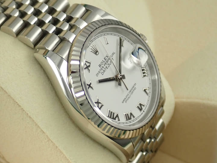 Pre-owned Rolex Datejust 36 Ref. 126234, stainless steel/white gold, white Roman numeral dial, Jubilee bracelet.  (40YPLCFC likely refers to an internal reference number or code)