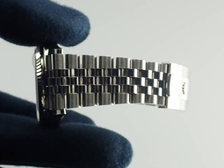 Pre-owned Rolex Datejust 36 Ref. 126234, stainless steel/white gold, white Roman numeral dial, Jubilee bracelet.  (40YPLCFC likely refers to an internal reference number or code)