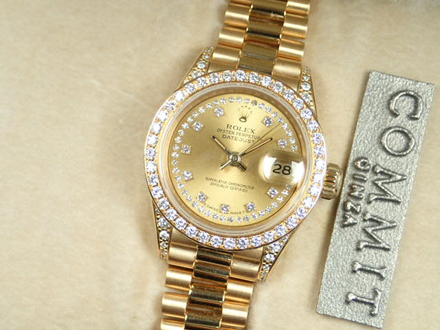 Rolex Datejust Ref. 69158, Millegrain diamond dial, pre-owned, President bracelet.