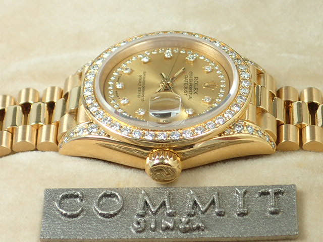 Rolex Datejust Ref. 69158, Millegrain diamond dial, pre-owned, President bracelet.