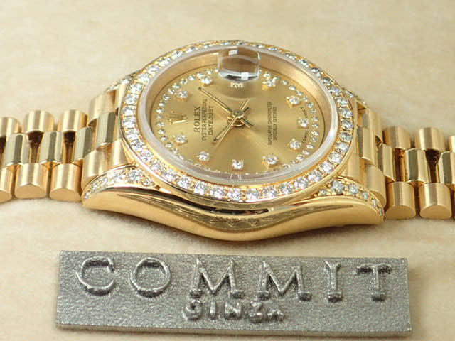 Rolex Datejust Ref. 69158, Millegrain diamond dial, pre-owned, President bracelet.