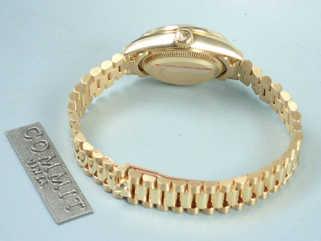 Rolex Datejust Ref. 69158, Millegrain diamond dial, pre-owned, President bracelet.