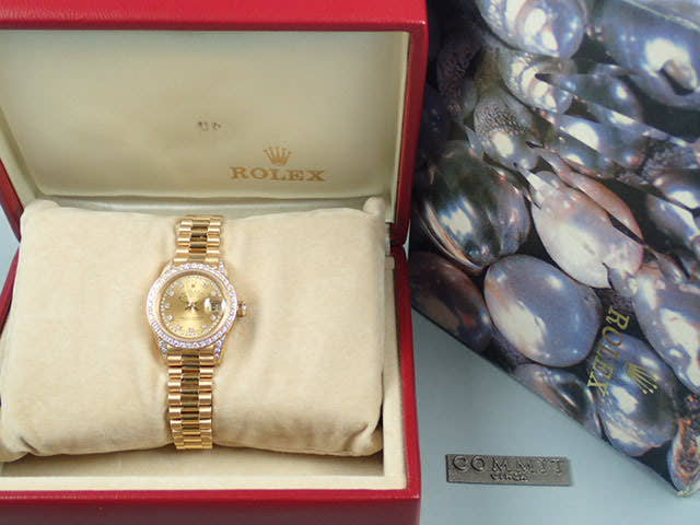 Rolex Datejust Ref. 69158, Millegrain diamond dial, pre-owned, President bracelet.