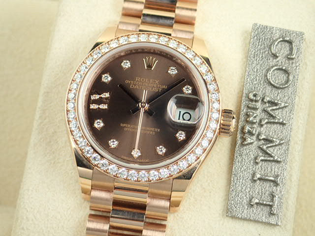 Pre-owned Rolex Datejust Ref. 279135RBR with chocolate dial, 9 star-shaped diamonds, and President bracelet.  (datejust-80)