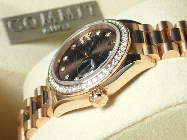 Pre-owned Rolex Datejust Ref. 279135RBR with chocolate dial, 9 star-shaped diamonds, and President bracelet.  (datejust-80)