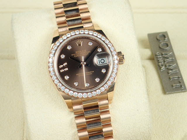 Pre-owned Rolex Datejust Ref. 279135RBR with chocolate dial, 9 star-shaped diamonds, and President bracelet.  (datejust-80)