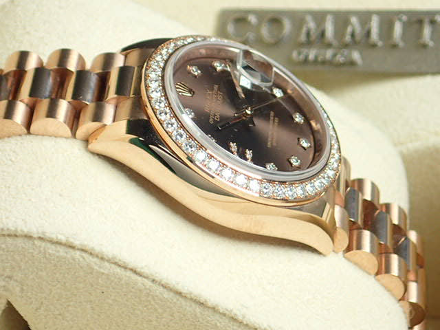 Pre-owned Rolex Datejust Ref. 279135RBR with chocolate dial, 9 star-shaped diamonds, and President bracelet.  (datejust-80)