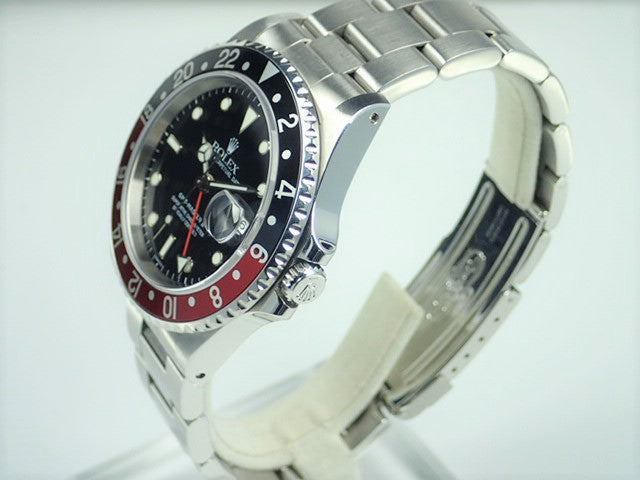 Rolex GMT Master II Red and Black Bezel U Series