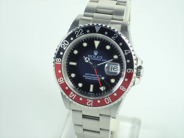 Rolex GMT Master II Red and Black Bezel U Series