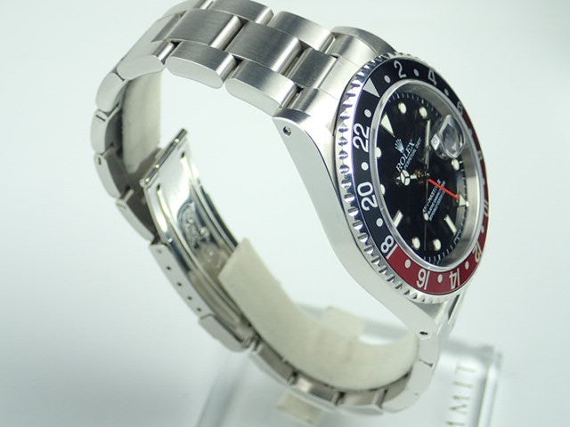 Rolex GMT Master II Red and Black Bezel U Series