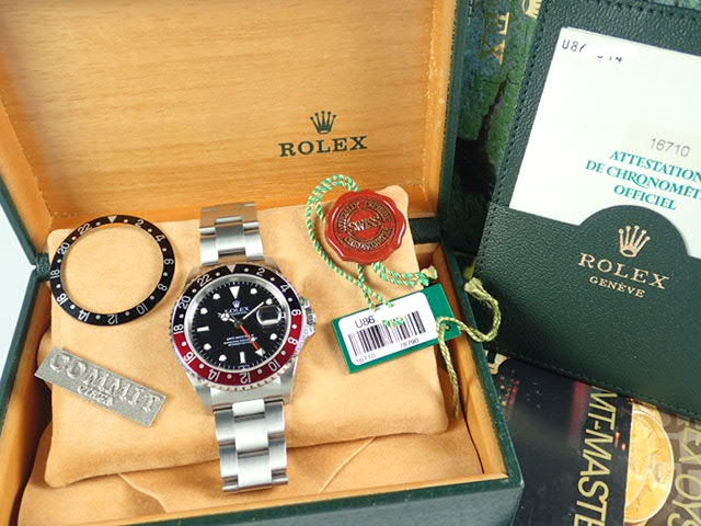 Rolex GMT Master II Red and Black Bezel U Series