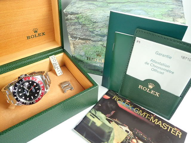 Rolex GMT Master II Red and Black Bezel F Series