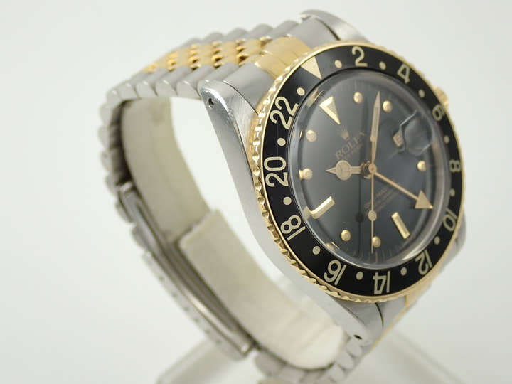 ロレックス GMTマスター Ref.16753 ステンレススチール/イエローゴールド ブラック文字盤 ジュビリーブレスレット 中古 M5X4YAFC