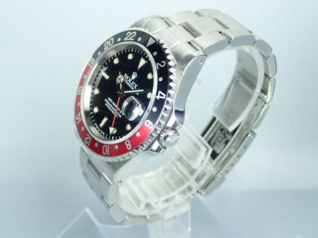 Rolex GMT Master II Red and Black Bezel U Series