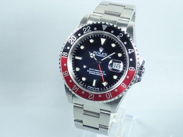 Rolex GMT Master II Red and Black Bezel U Series