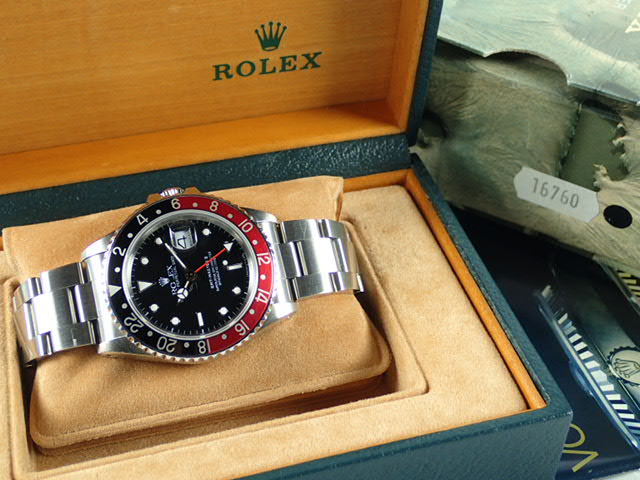 Rolex GMT Master II Red and Black Bezel