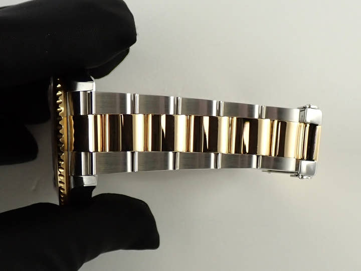 Rolex GMT-Master II Ref. 16713 Stainless Steel/Yellow Gold Black Dial