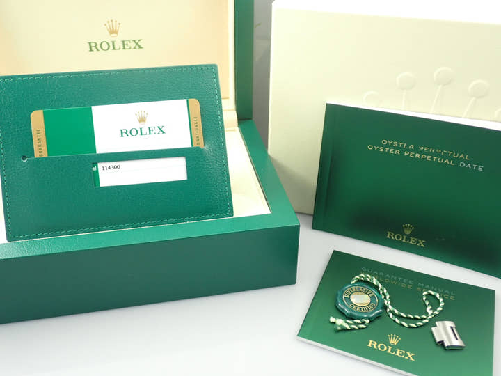 Rolex Oyster Perpetual 39 Ref. 114300 Stainless Steel White Dial