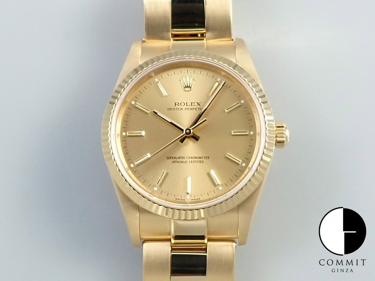 Rolex Oyster Perpetual Ref. 14238 Yellow Gold Champagne Dial