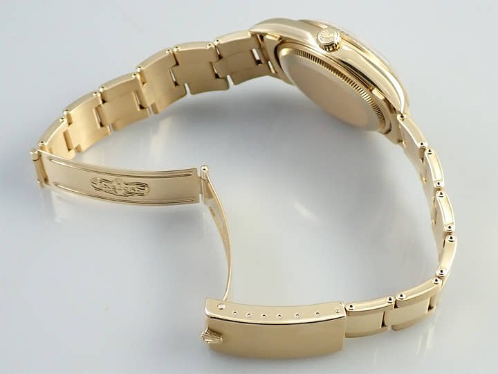 Rolex Oyster Perpetual Ref. 14238 Yellow Gold Champagne Dial