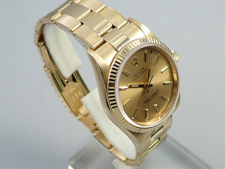 Rolex Oyster Perpetual Ref. 14238 Yellow Gold Champagne Dial