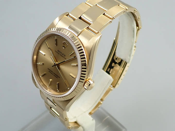 Rolex Oyster Perpetual Ref. 14238 Yellow Gold Champagne Dial