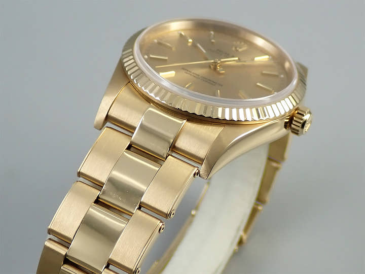 Rolex Oyster Perpetual Ref. 14238 Yellow Gold Champagne Dial