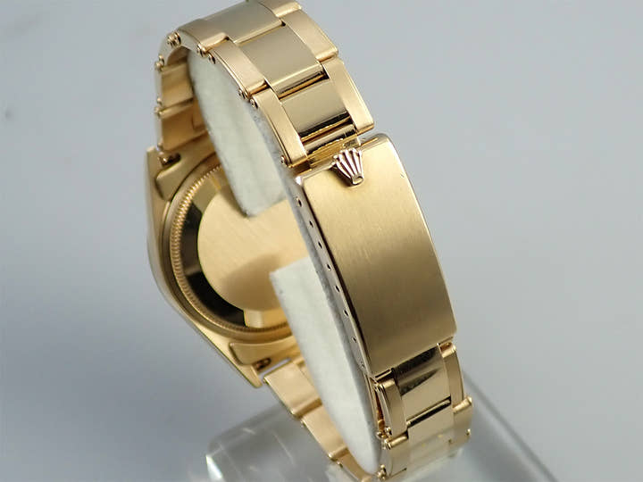 Rolex Oyster Perpetual Ref. 14238 Yellow Gold Champagne Dial