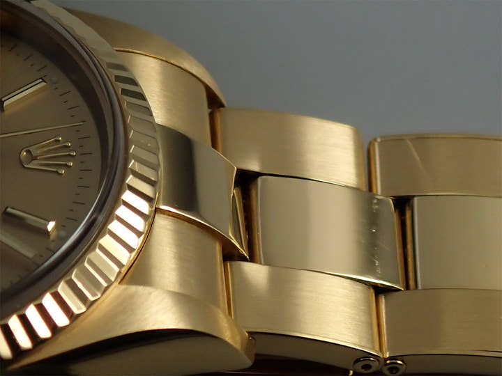 Rolex Oyster Perpetual Ref. 14238 Yellow Gold Champagne Dial