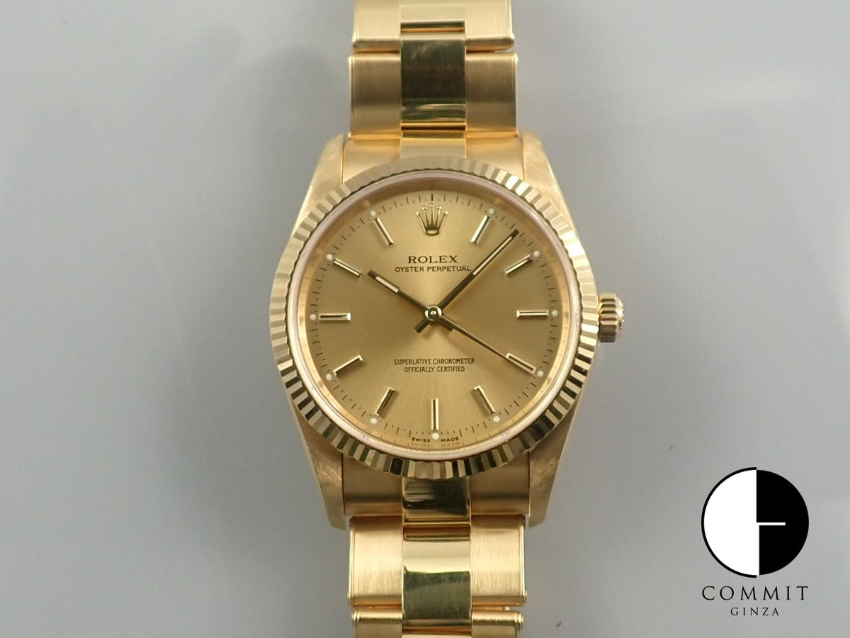 Rolex Oyster Perpetual Ref. 14238M Yellow Gold Champagne Dial