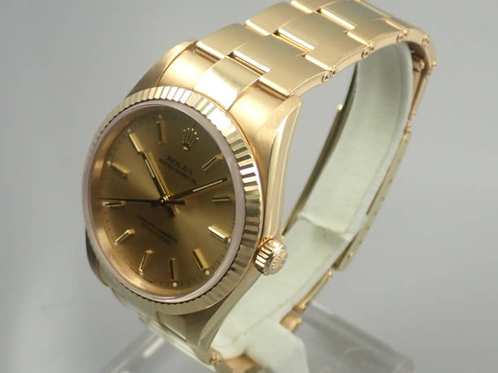 Rolex Oyster Perpetual Ref. 14238M Yellow Gold Champagne Dial
