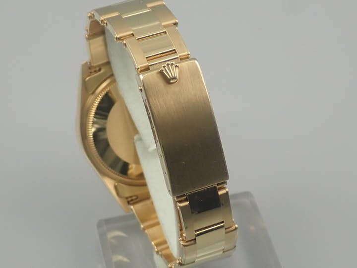 Rolex Oyster Perpetual Ref. 14238M Yellow Gold Champagne Dial