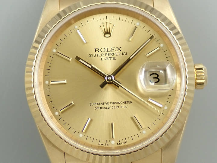 Rolex Oyster Perpetual Date Ref. 15238 Yellow Gold Champagne Dial