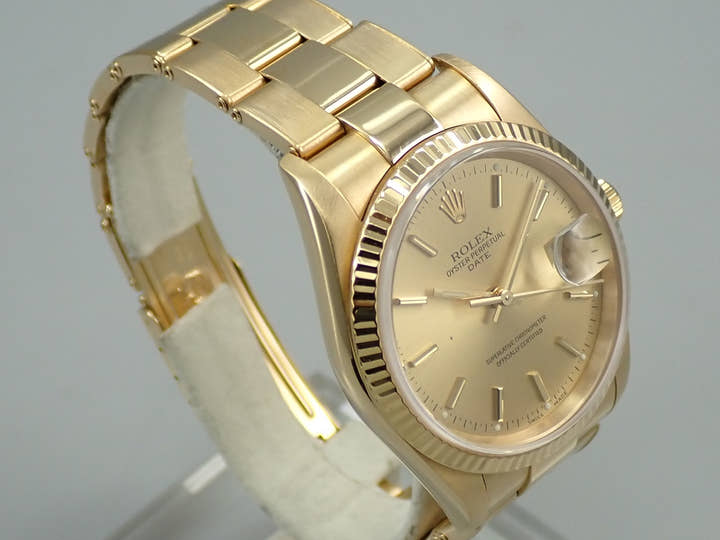 Rolex Oyster Perpetual Date Ref. 15238 Yellow Gold Champagne Dial