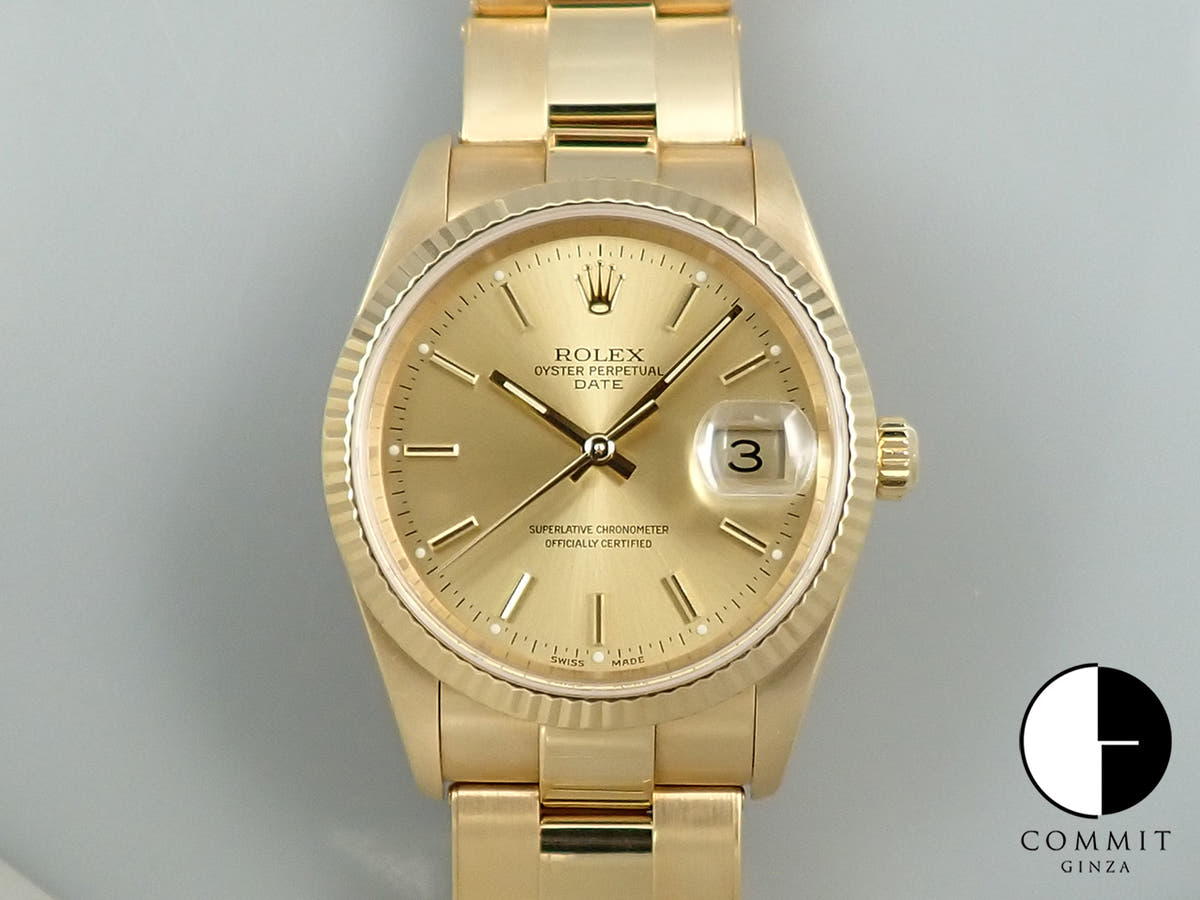 Rolex Oyster Perpetual Date Ref. 15238 Yellow Gold Champagne Dial